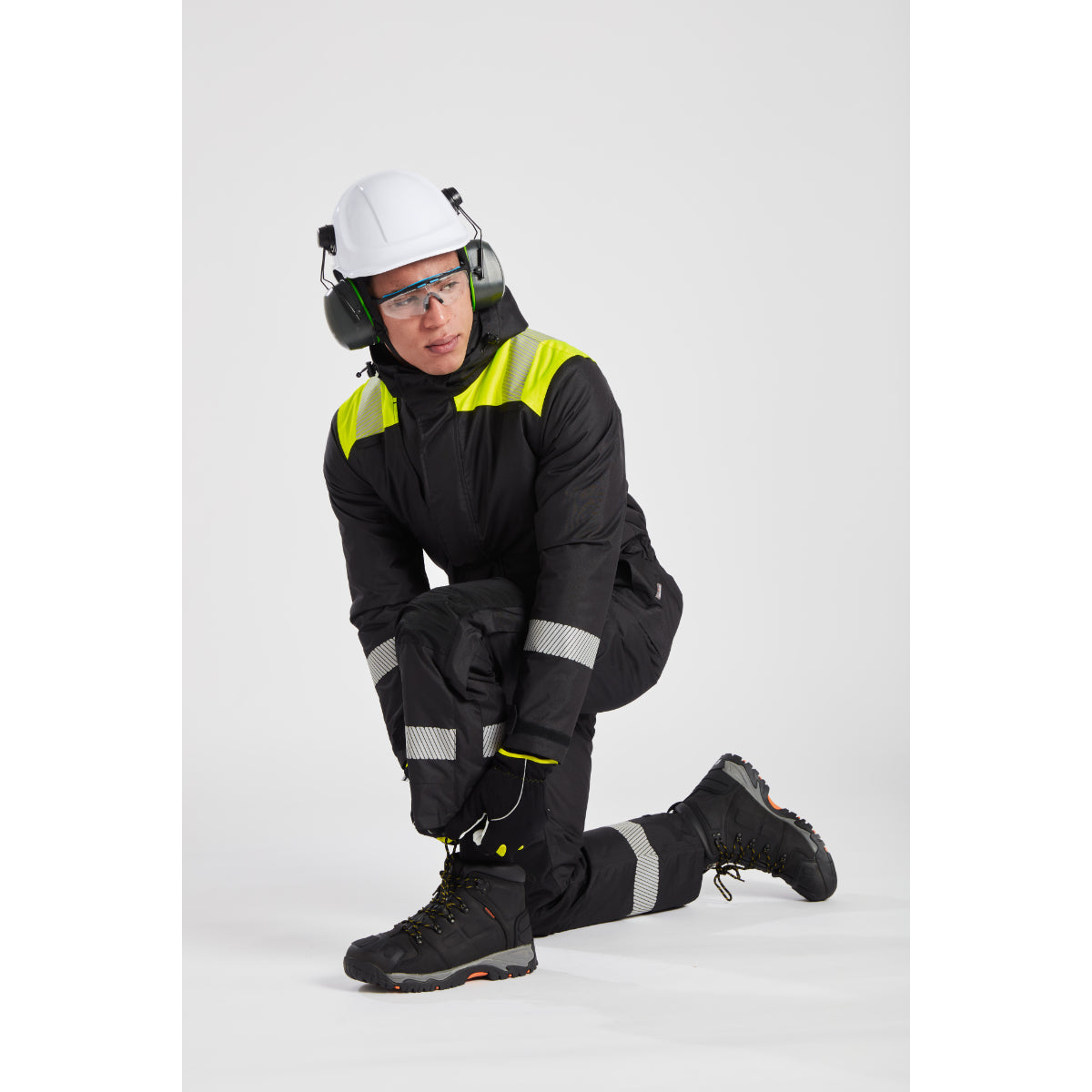 Detail of the side leg zipper for easy access over boots on the Portwest PW3 coverall.