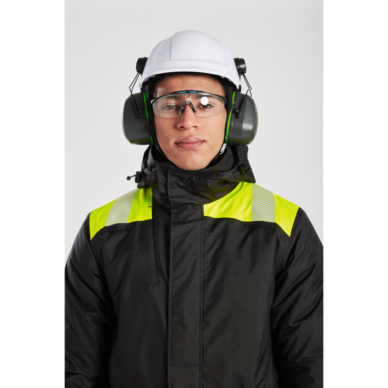 Model wearing Portwest helmet and Top Guard safety glasses.