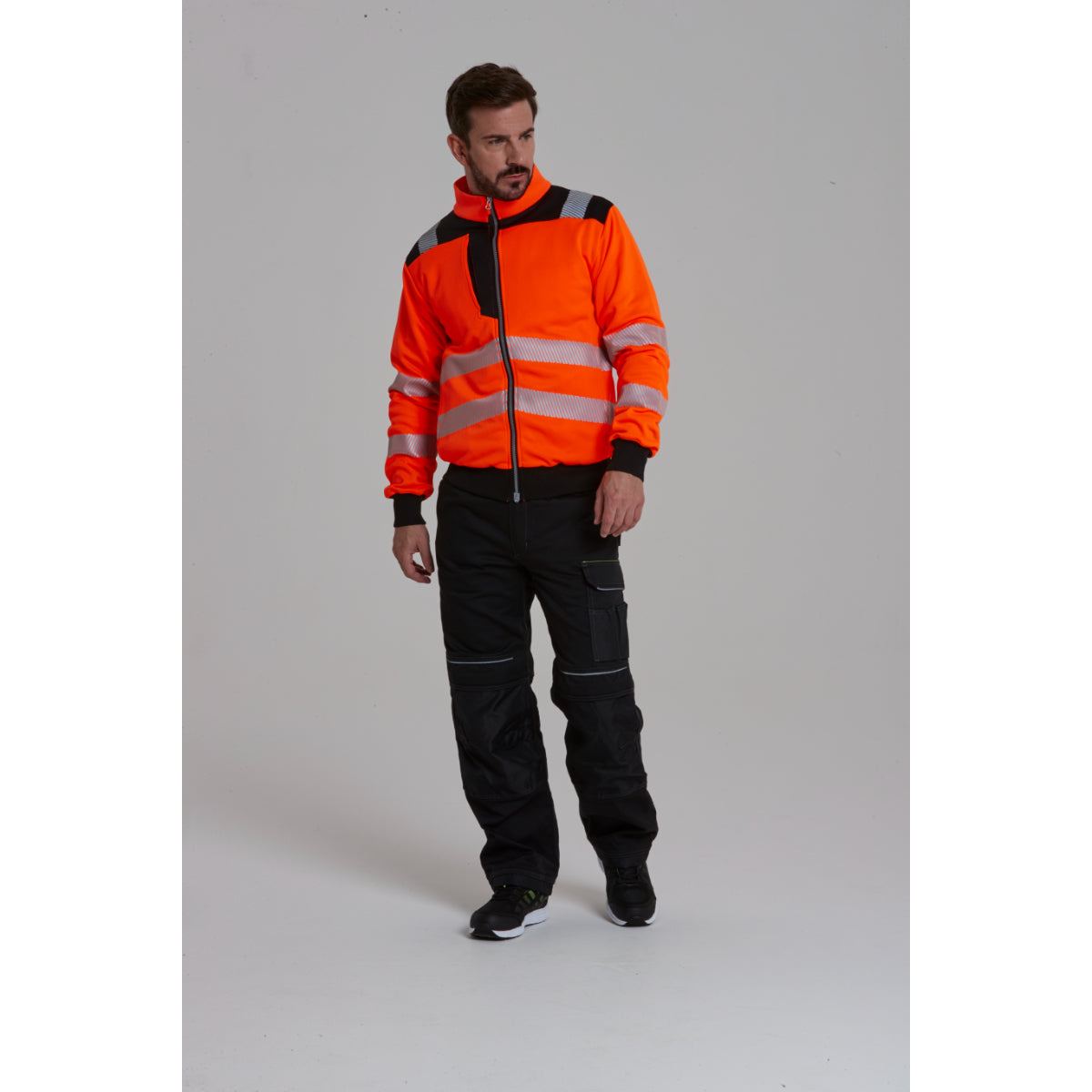 Angled front view of a model wearing the orange Portwest PW3 hi-vis sweatshirt.