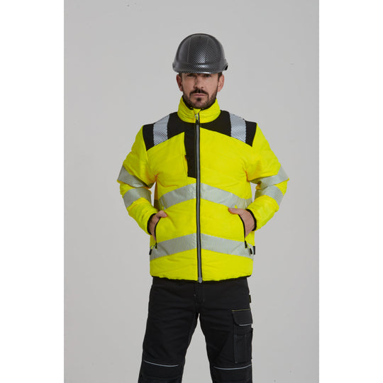 Worker wearing the Portwest PC55 carbon look helmet with safety glasses.