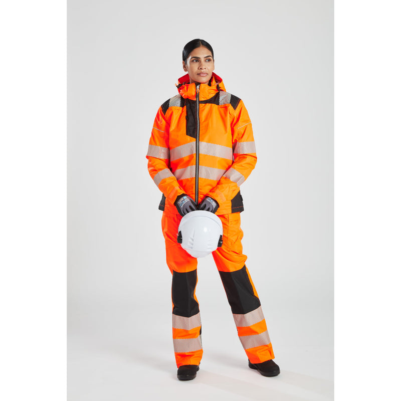 Front view of a woman in the orange Portwest PW3 Hi-Vis Winter Jacket.
