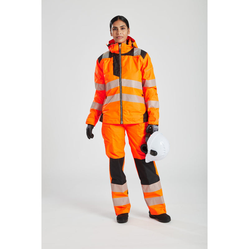 Side view of a woman wearing the orange Portwest PW3 Hi-Vis Winter Jacket.
