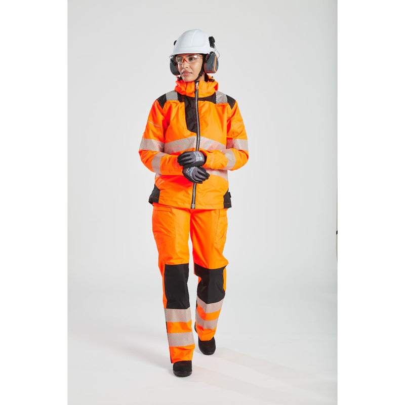 A work team in Portwest hi-vis gear, with the woman wearing the orange PW3 jacket.

