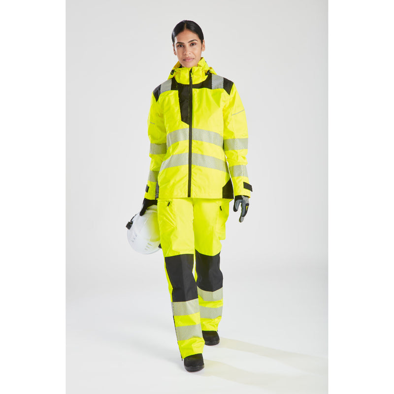 Woman wearing the yellow Portwest PW3 hi-vis rain jacket, three-quarter front view.
