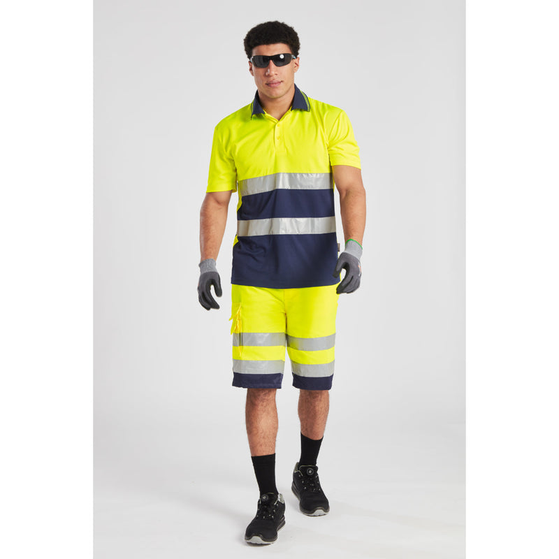 Model wearing Portwest Hi-Vis Lightweight Poly-Cotton Shorts L043 with other safety gear.