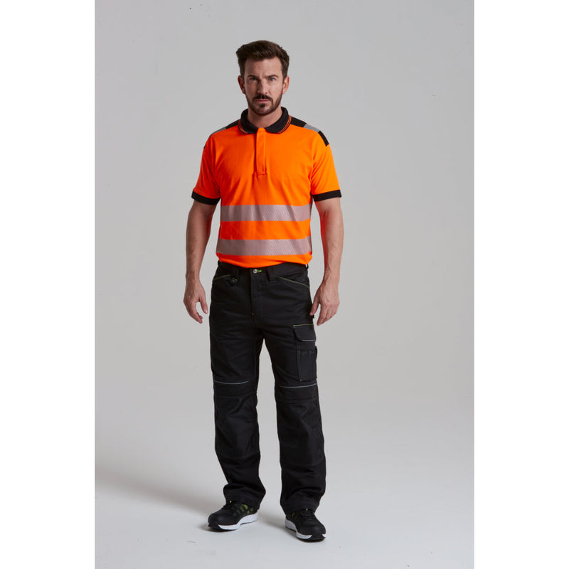 worker in Portwest trousers and polo.