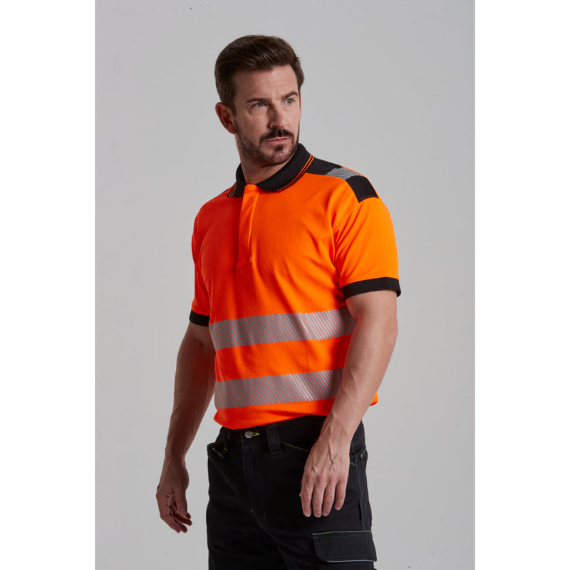 worker in Portwest trousers and hi-vis polo.