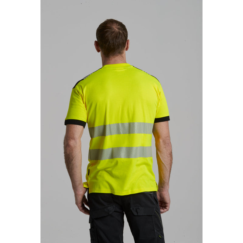 Man smiling while wearing the yellow Portwest PW3 hi-vis t-shirt.