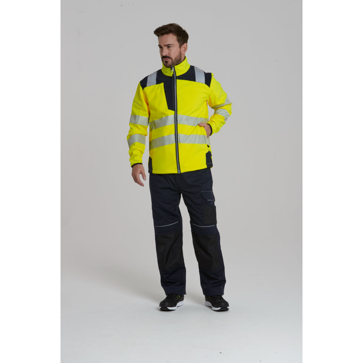 Worker wearing the Portwest   Hi-Vis Softshell  jacket.