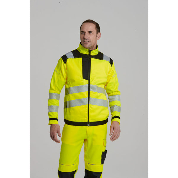 Man wearing the hi-vis work jacket layered over a fleece for extra warmth.