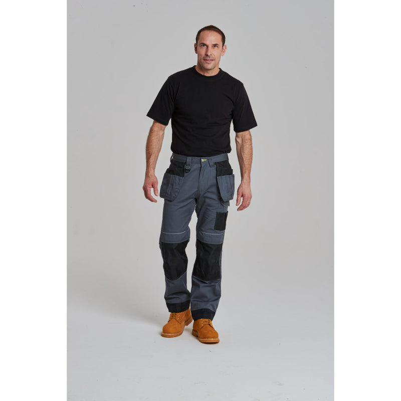 Close-up of brown safety boot with reinforced toe and durable sole for heavy-duty industrial environments.