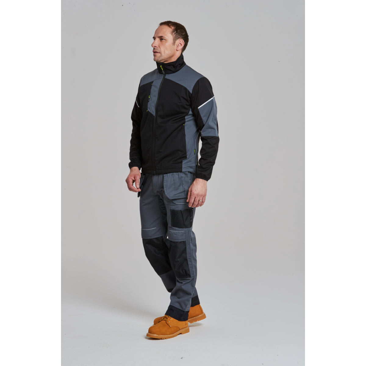 Side profile of a worker showing the fit of the jacket.