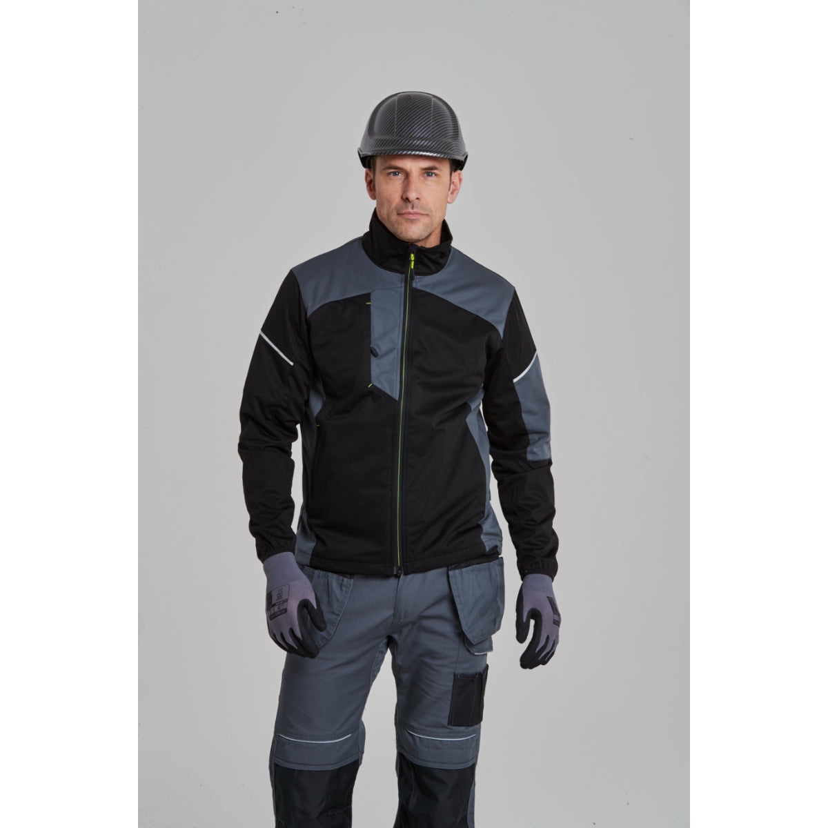 A person in Portwest workwear, including Dermiflex Aqua gloves.