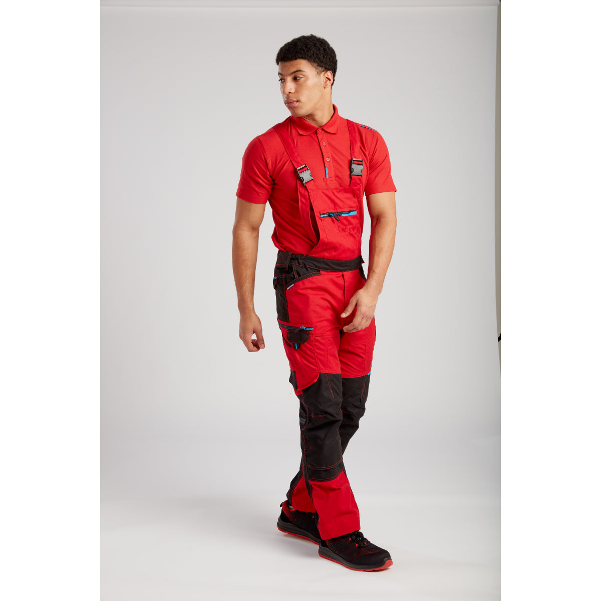 A complete workwear setup featuring the Portwest WX3 Bib and Brace (T704).