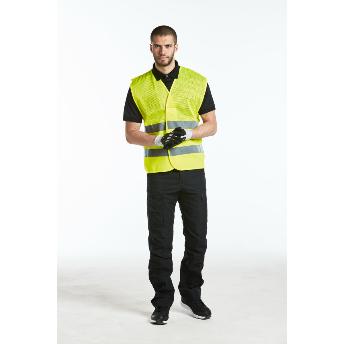 Black and grey high-performance jacket – side pose on model