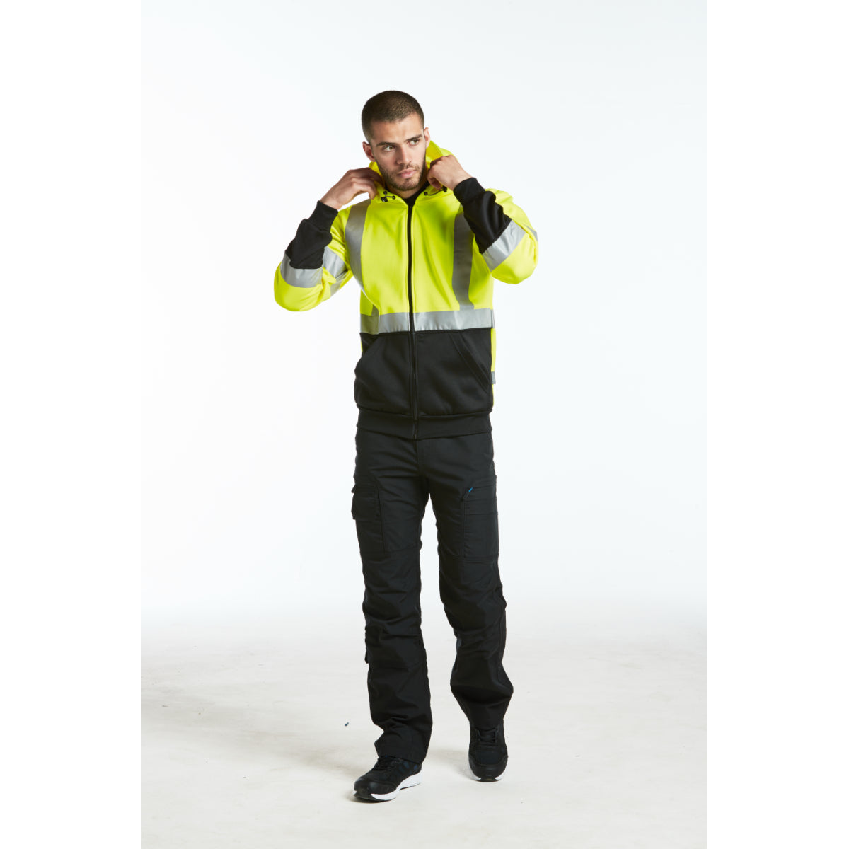 Portwest KX3 ripstop trousers, focusing on the rear pockets and yoke for a secure fit.