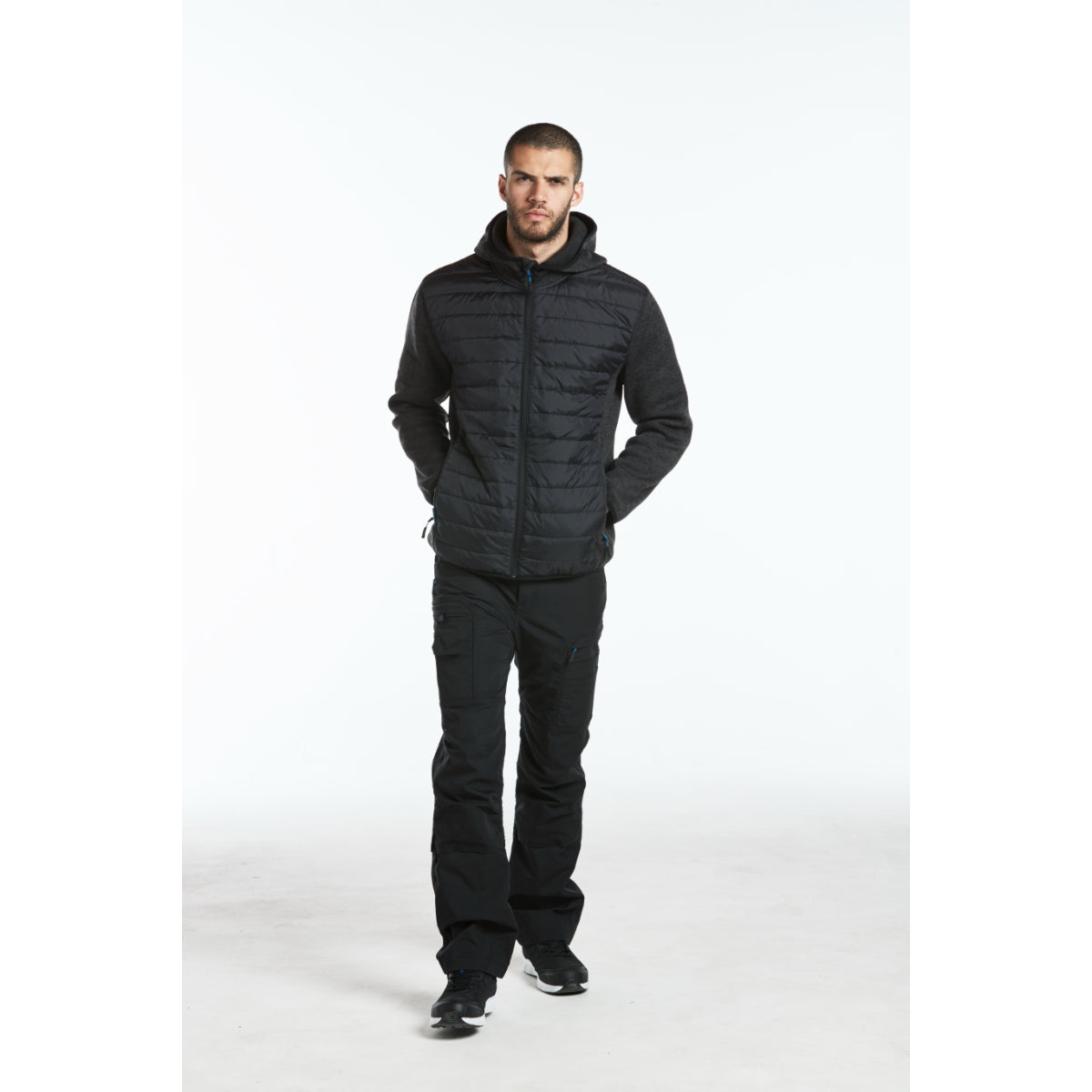 Portwest T832 waterproof jacket (black) paired with T801 work trousers, on a mannequin