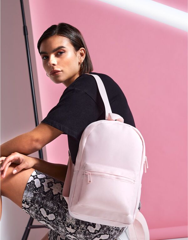 A bright pink recycled waistpack.