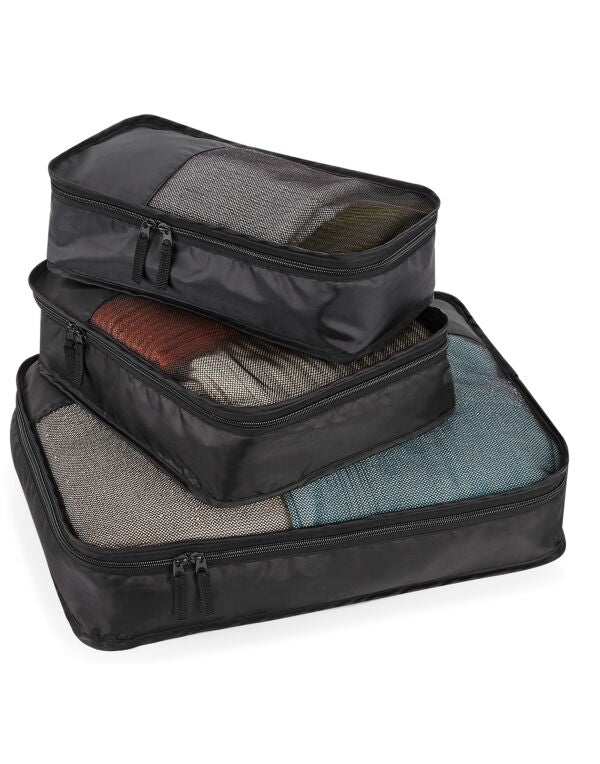 The complete three-piece Bagbase Escape Packing Cube Set in black, shown nested together for compact storage.
