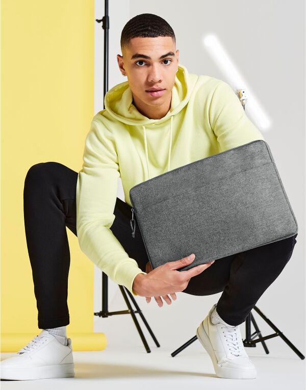 Angled view of the Bagbase Essential 15" Laptop Case, highlighting its padded, protective structure.