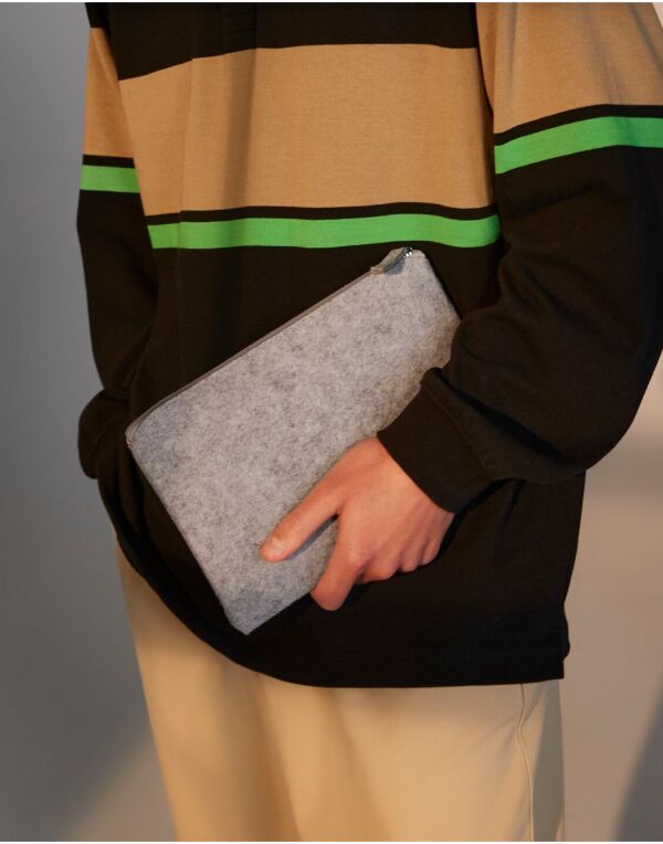 Angled view of the light grey marl Bagbase Felt Accessory Pouch, ideal for cosmetics or stationery.