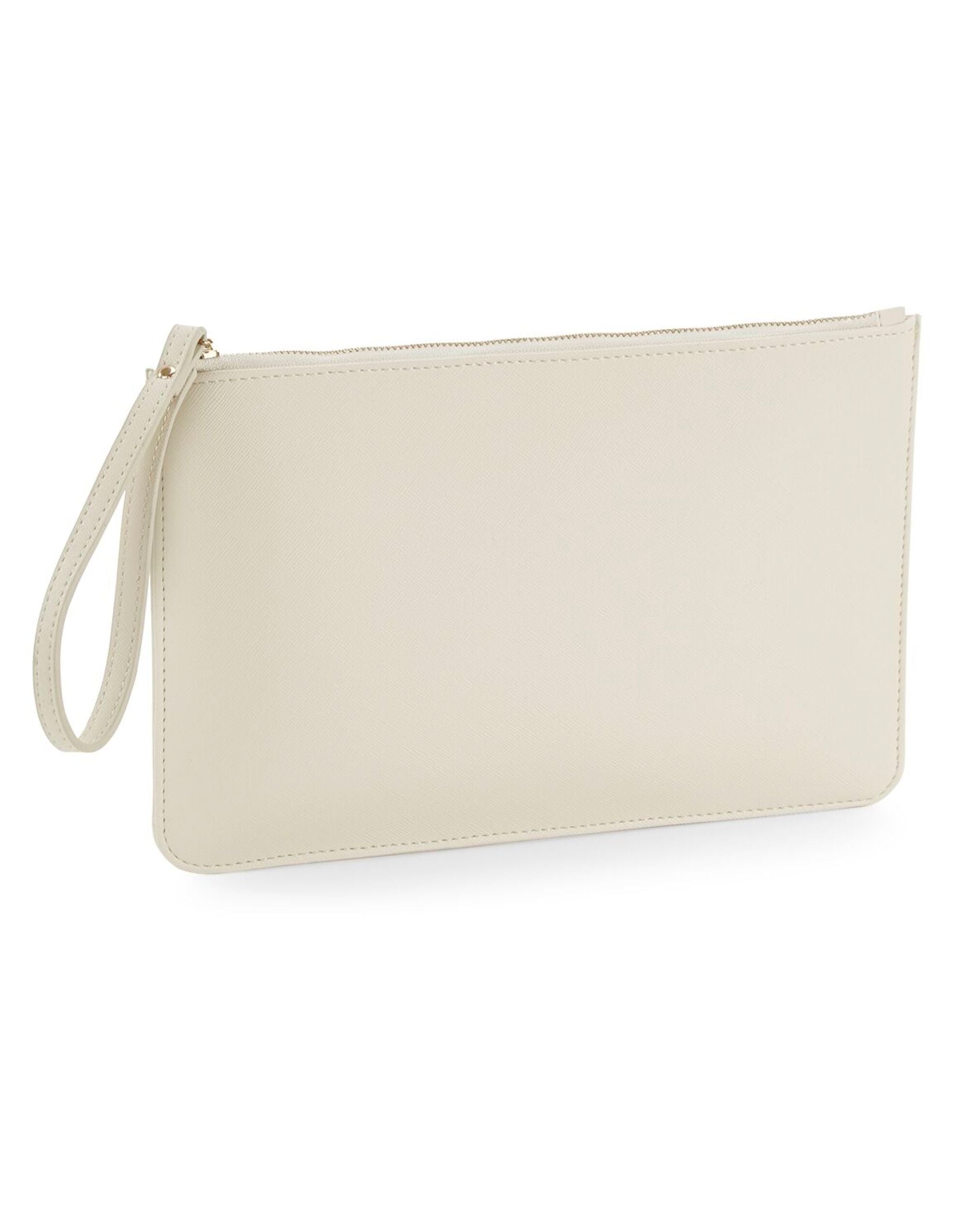 The soft pink Boutique Accessory Pouch, held in hand to show its scale.