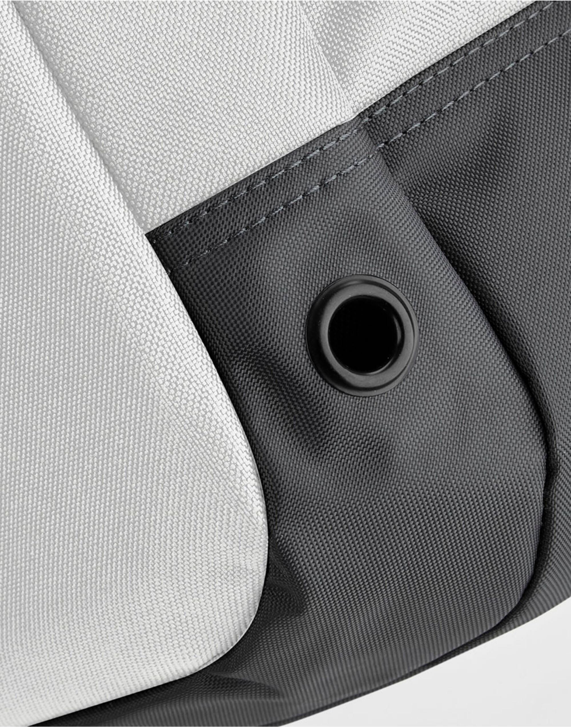 Close-up on the durable zippers and hardware of the Bagbase Athleisure Sports Backpack.