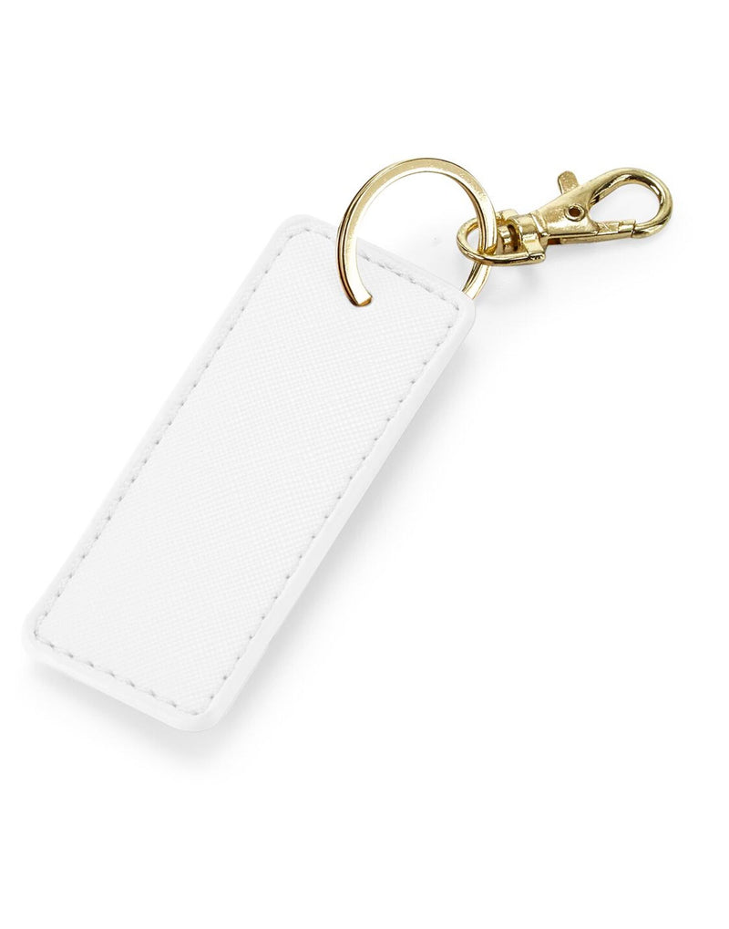 A collection of Bagbase Boutique Key Clips in black, white, grey, and pink.