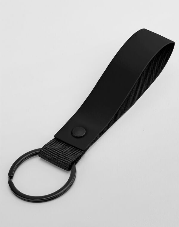 Black rectangular matte PU keyring with gold-colored metal clip.
