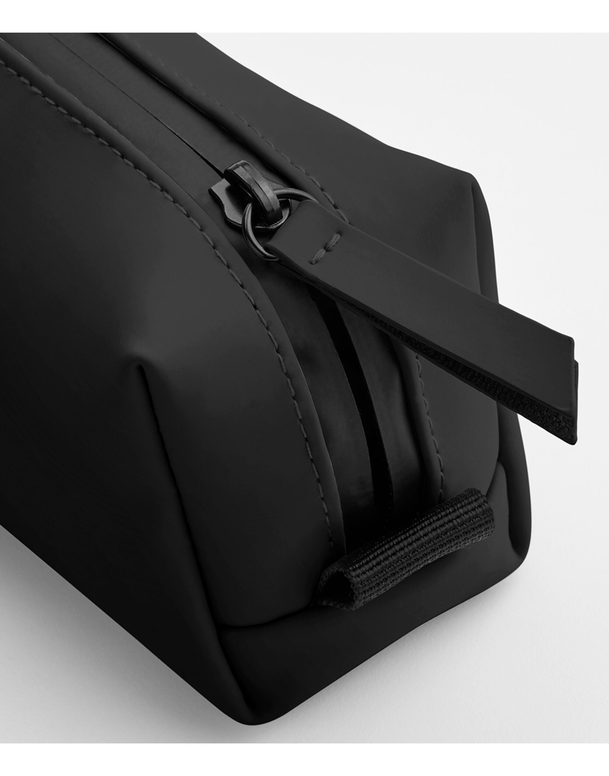 Angled view of the black matte PU accessory case.