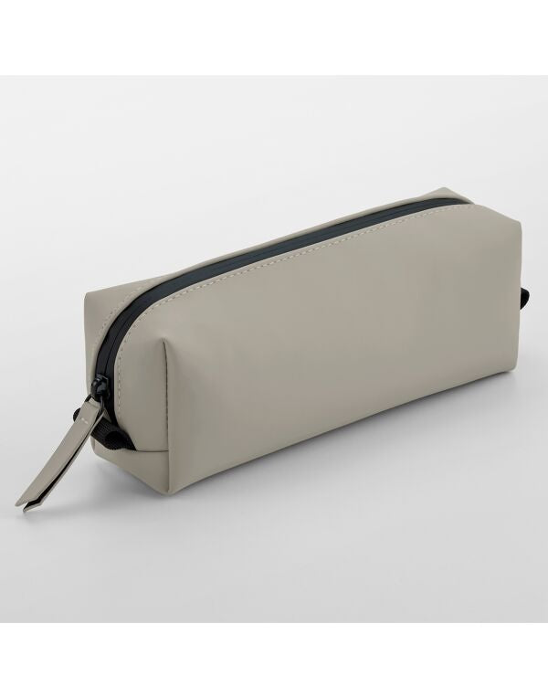 Grey matte PU mini accessory case with wrap-around zipper.