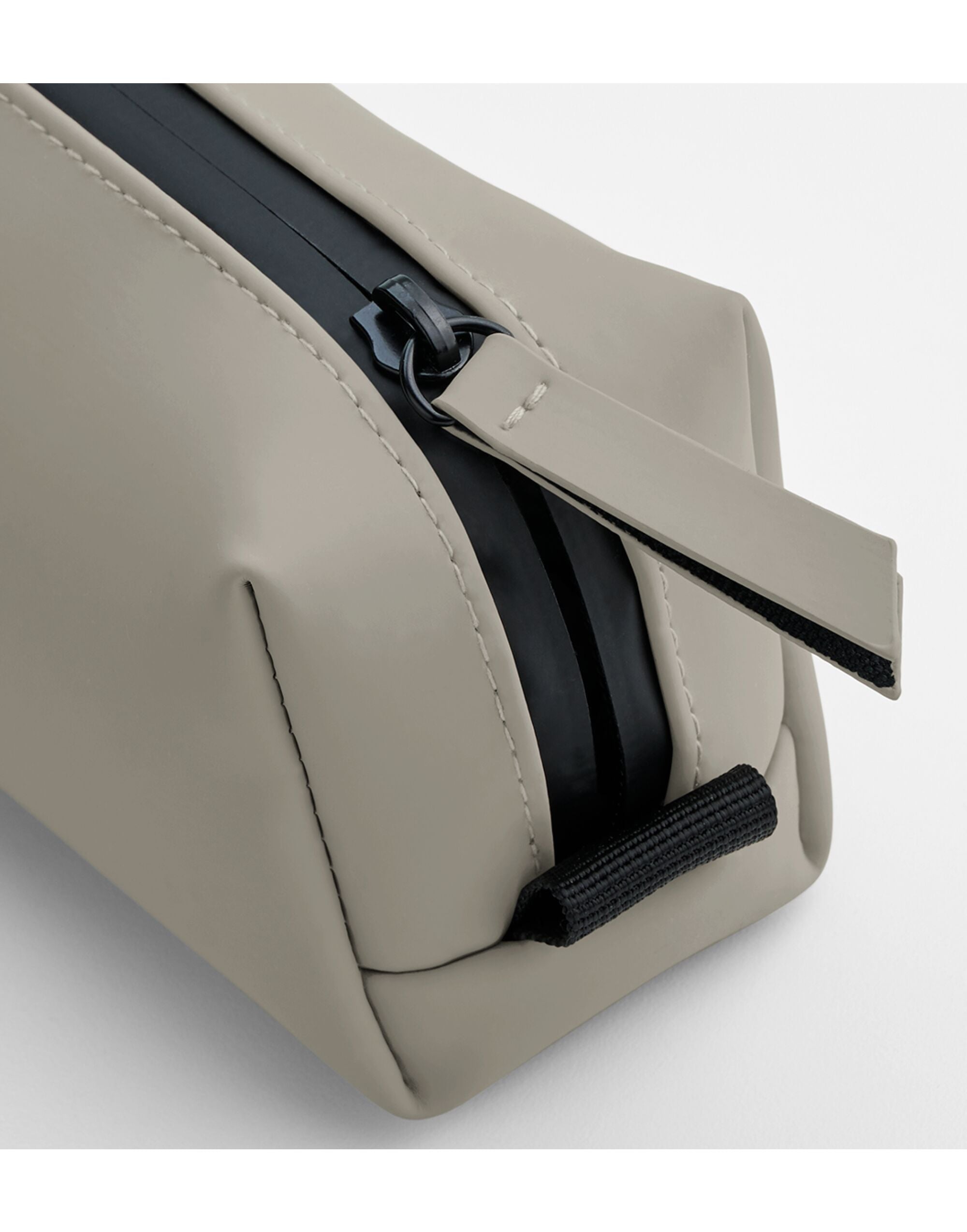 Angled view of the grey matte PU accessory case.