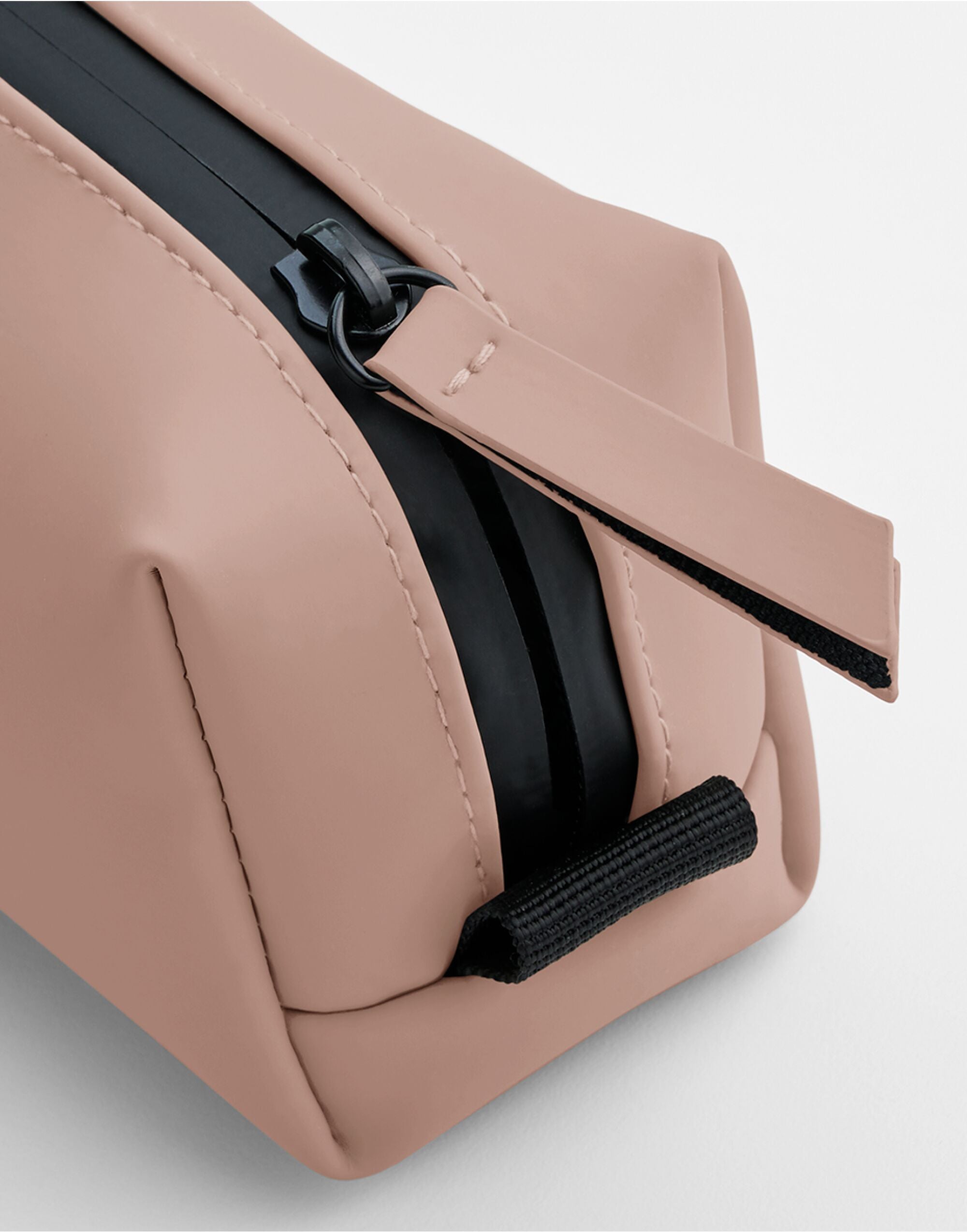 Open view of the black case showing the internal compartment.