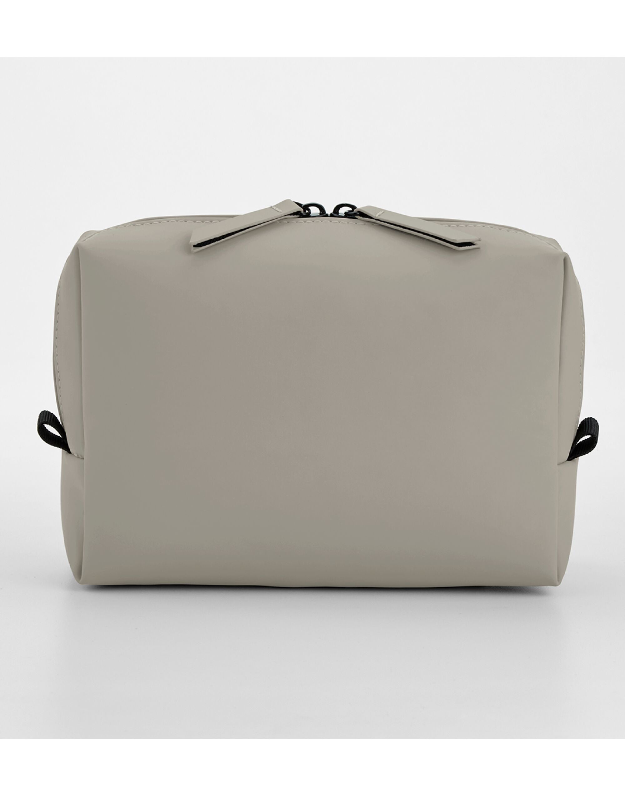 Person holding the grey matte PU cross body bag to show size.
