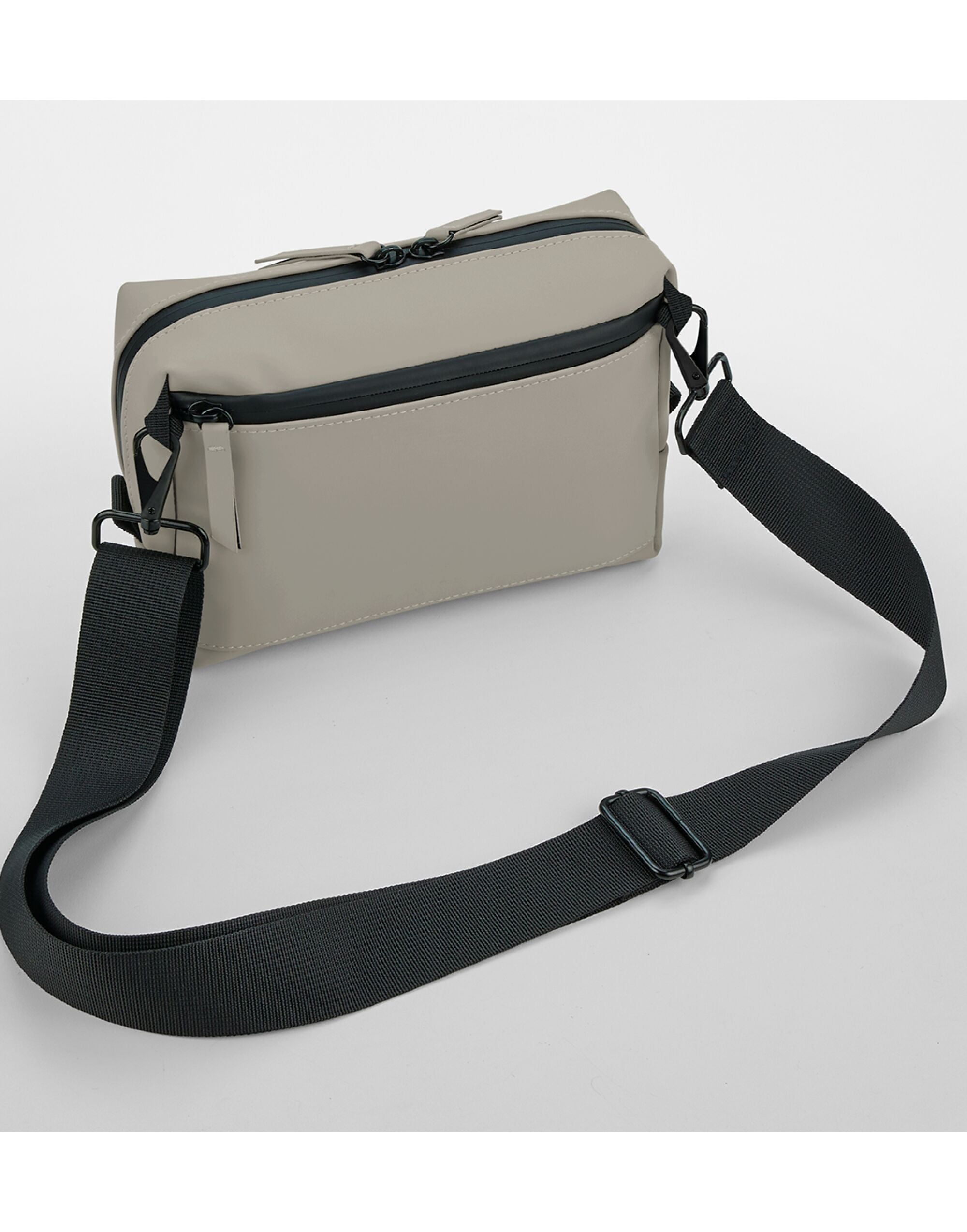 Grey matte PU cross body bag, front view.