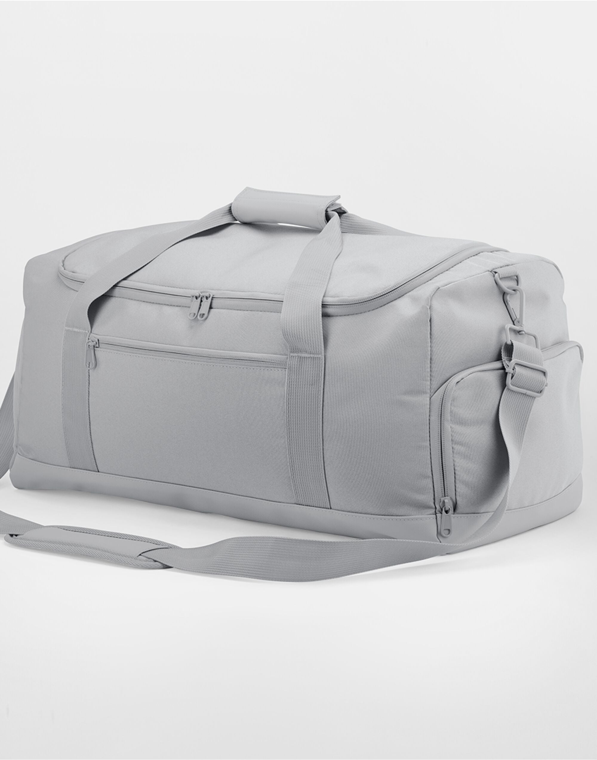 The classic red Bagbase Medium Training Holdall, a vibrant and practical choice for sports.