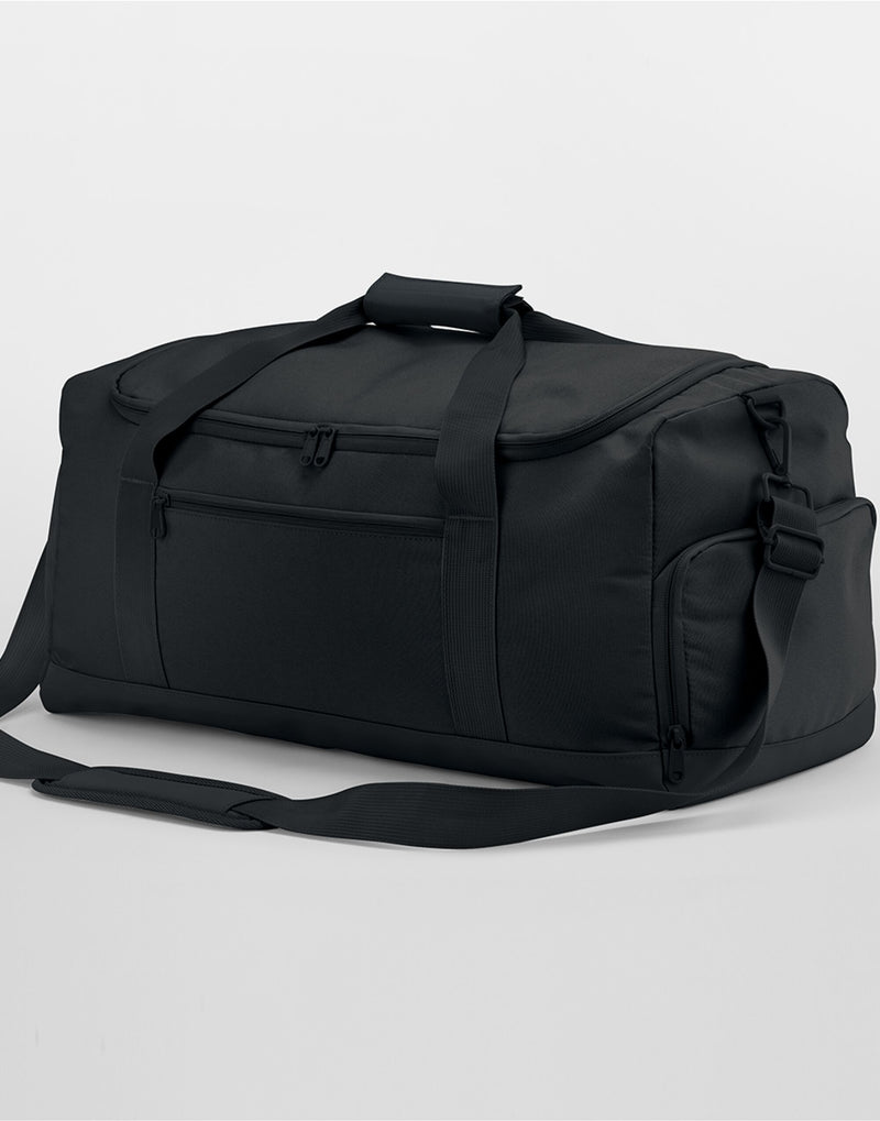 Detail shot of the padded handle wrap on the Bagbase Medium Training Holdall for comfortable carrying.