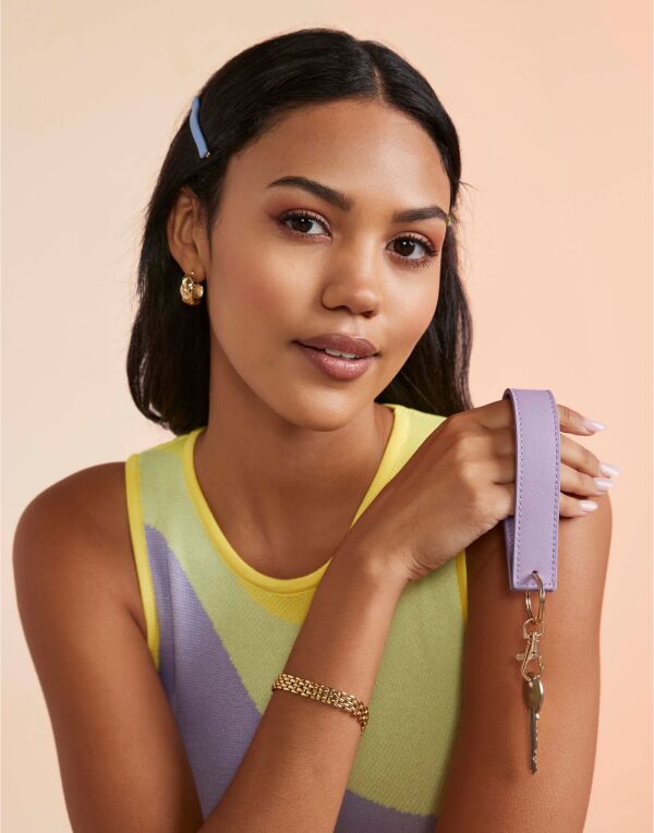 Angled view of the soft pink Bagbase Boutique Wristlet Keyring, showing the gold metal hardware.