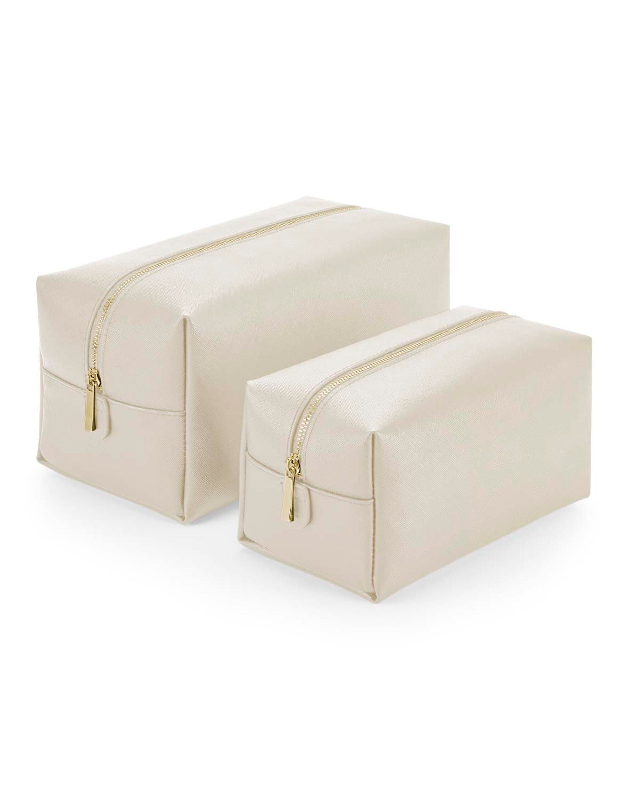 The soft pink toiletry case, perfect for a stylish and coordinated travel set.