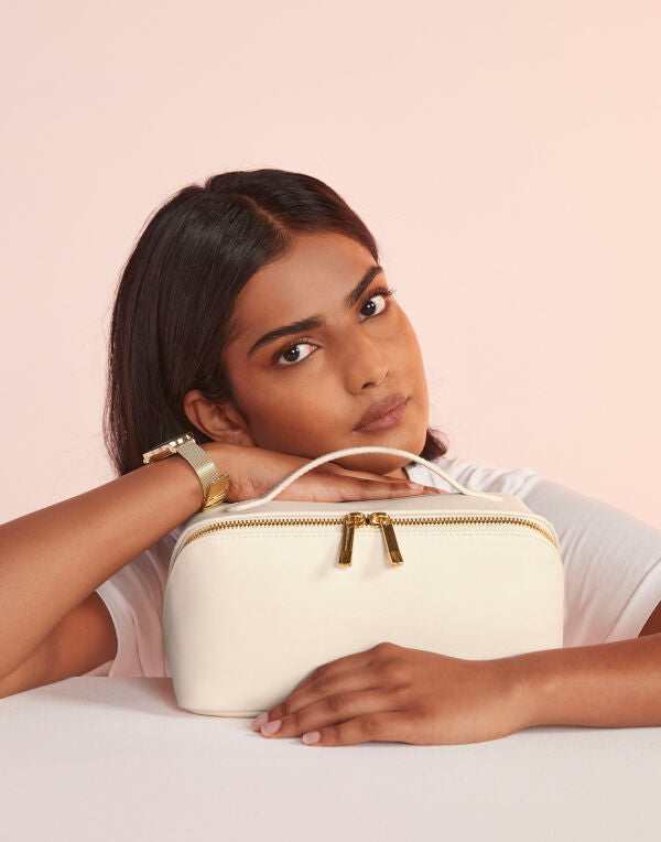 Three-quarter view of the closed Bagbase Boutique open flat accessory case, highlighting its sleek, compact profile.