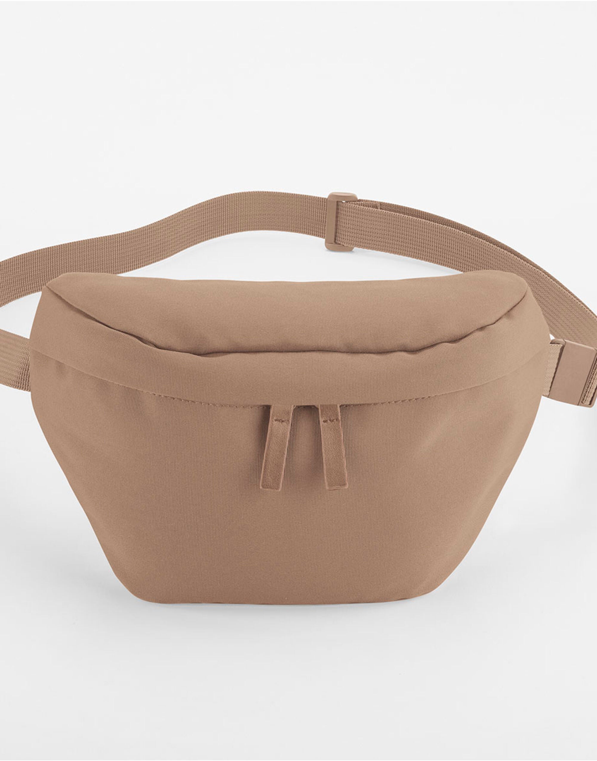 A person wearing the off-white Bagbase Simplicity Waistpack to demonstrate its size and comfortable fit.