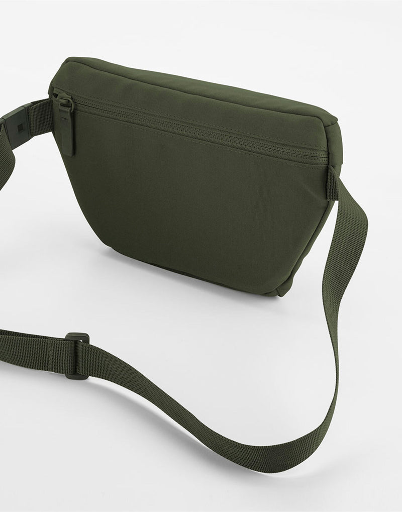 Angled side shot of the off-white Bagbase Simplicity Waistpack, highlighting its chic and functional design.