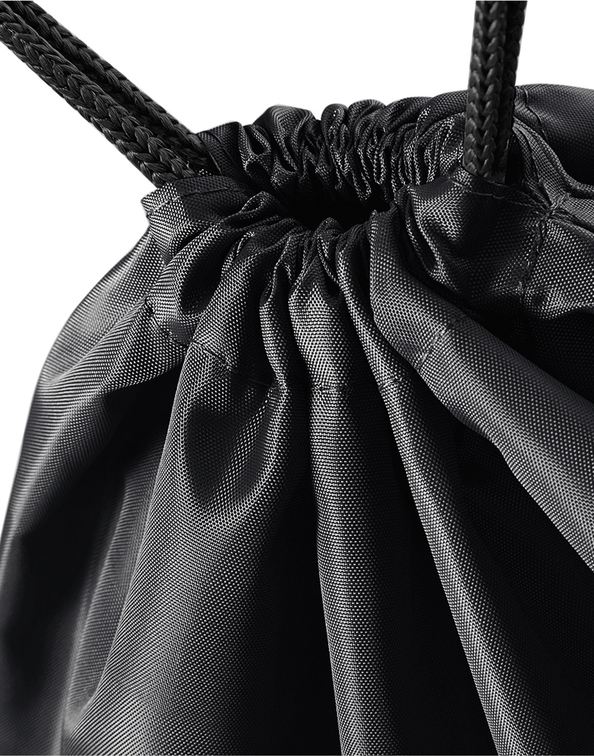 Detail of the metal eyelets on a black Bagbase Premium Gymsac.