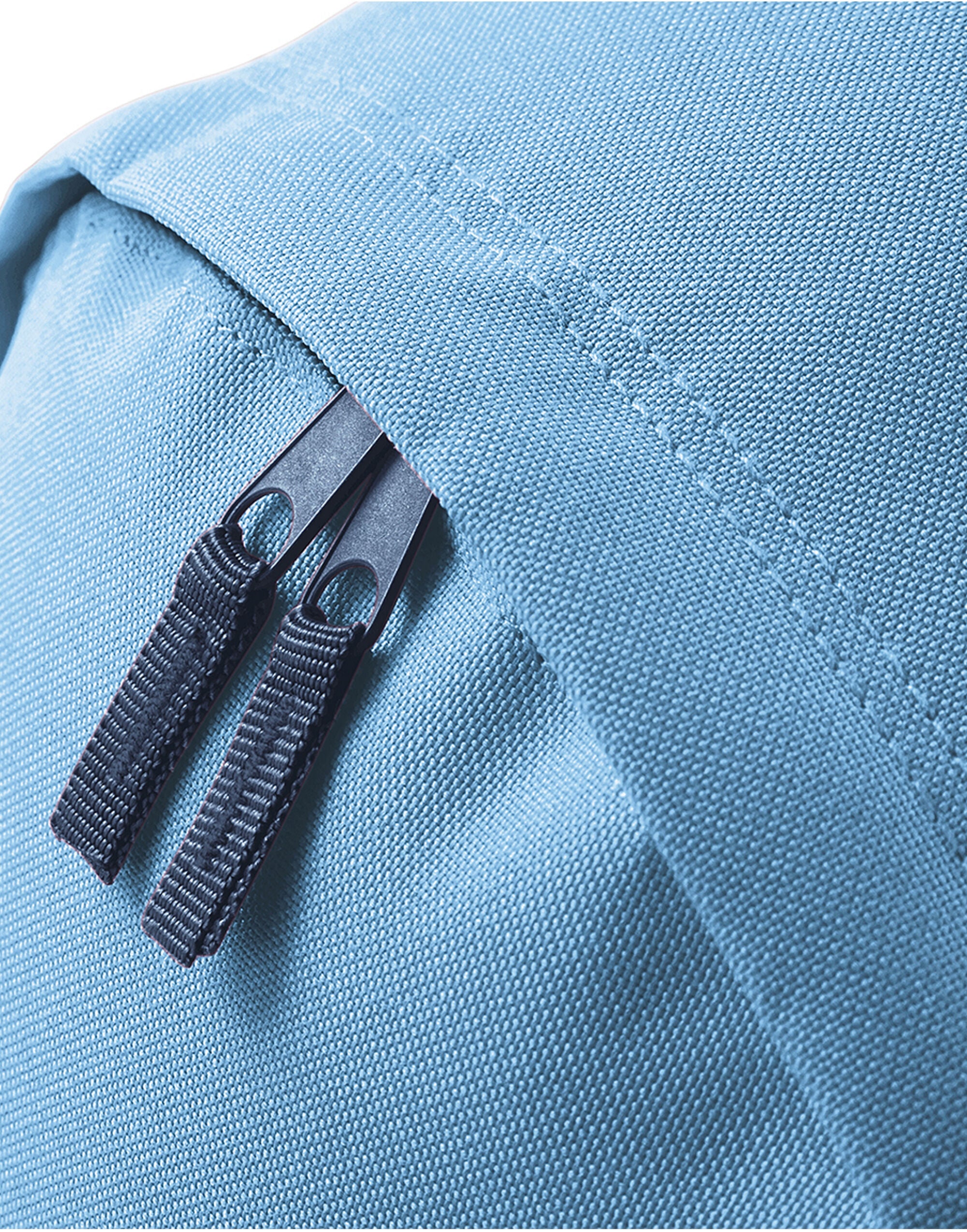 A mint green Mini Barrel Bag laid flat.