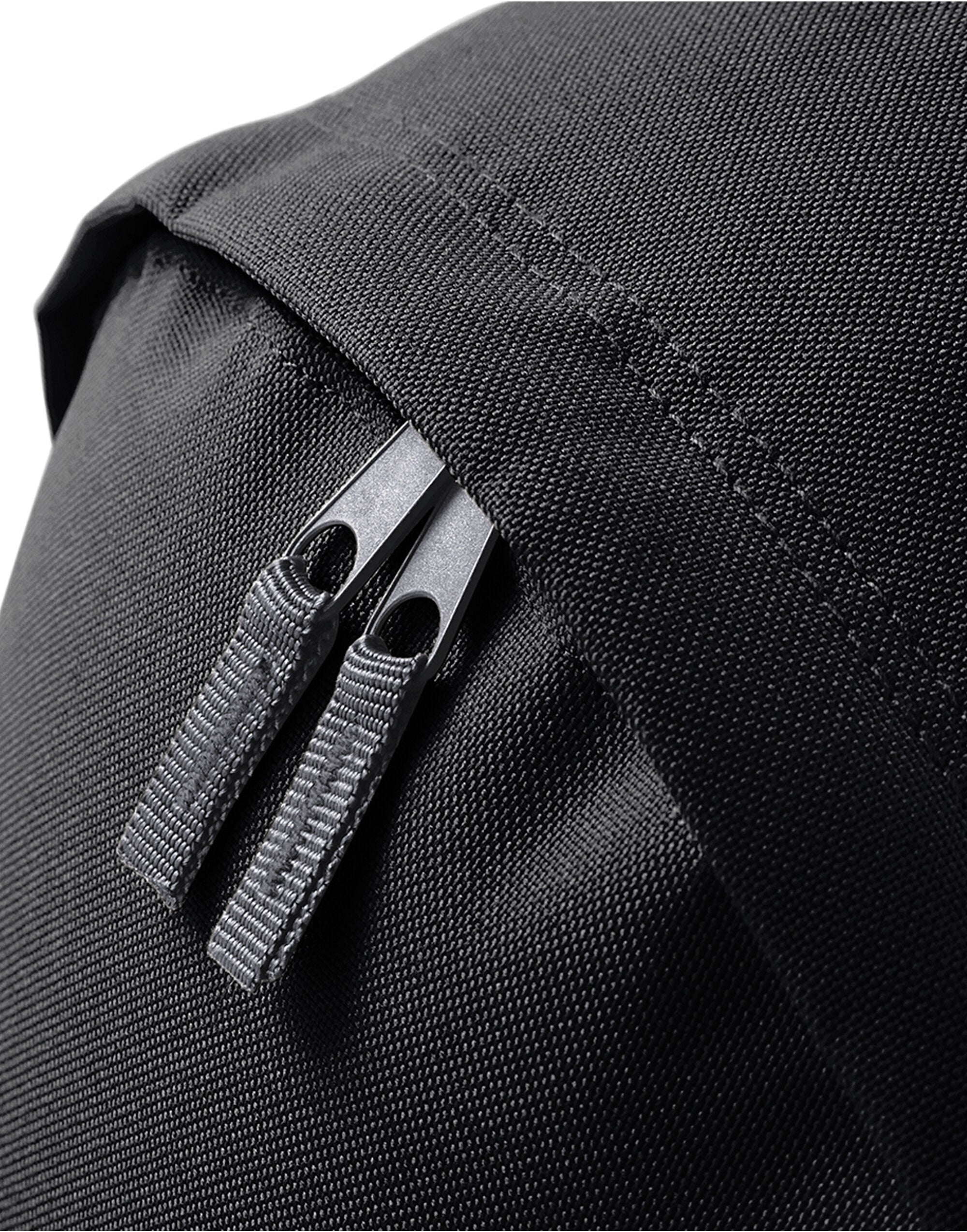 A black junior backpack with dark black accents.