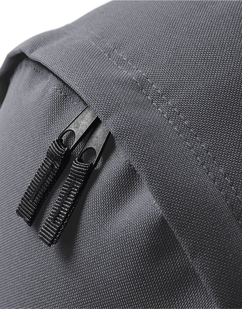 A purple Original Fashion Backpack with contrasting zippers.