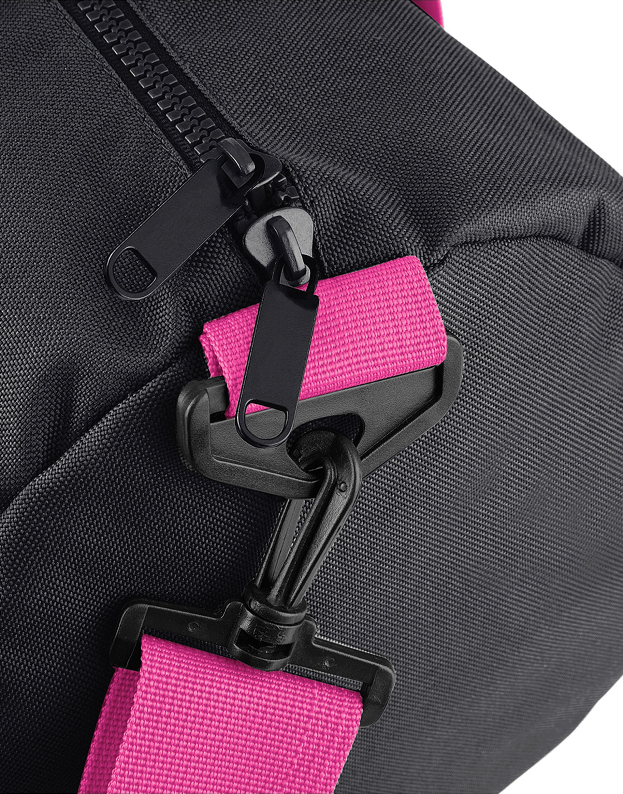 Detail of the front pocket on the black mini backpack.