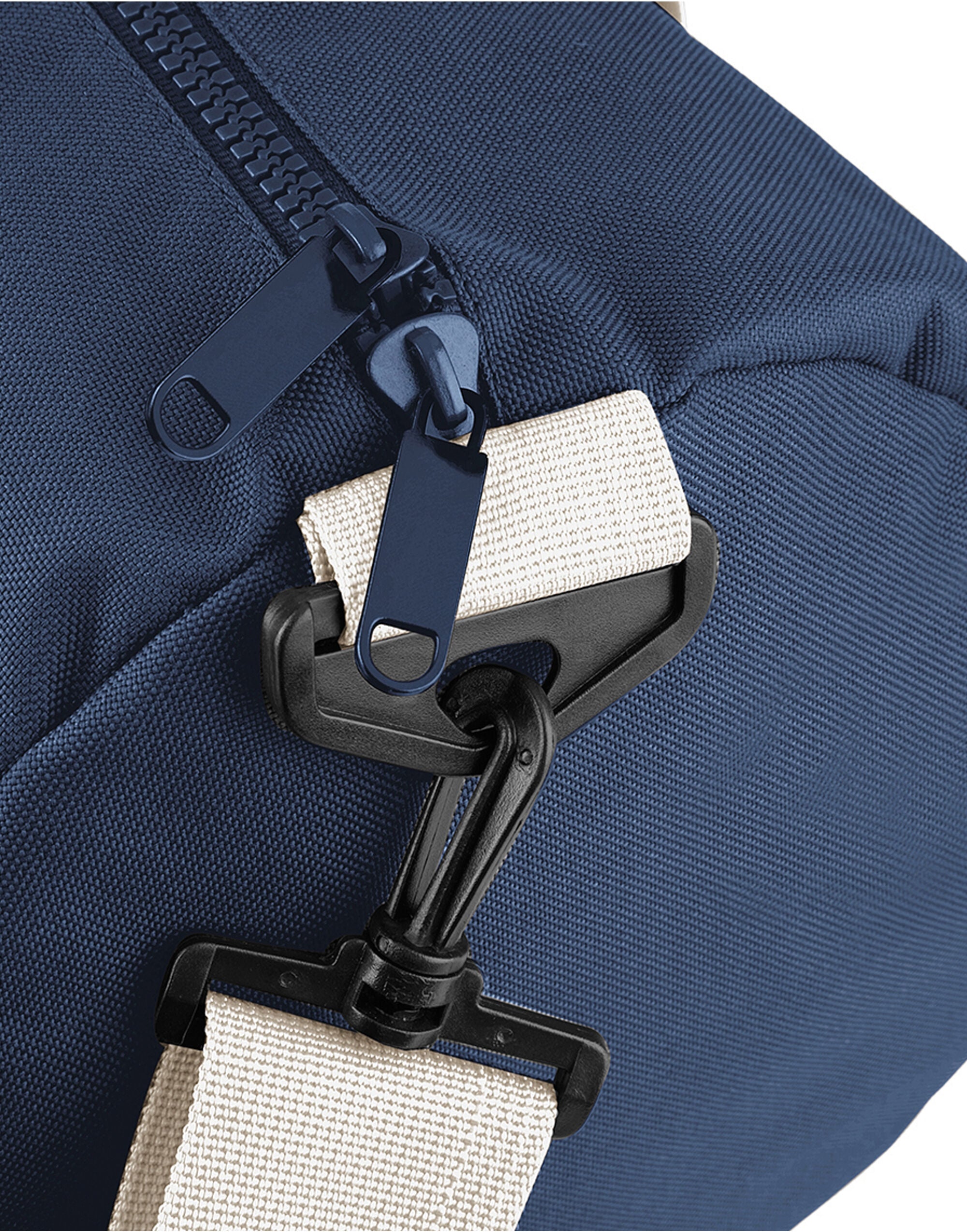 A royal blue messenger bag with white piping.