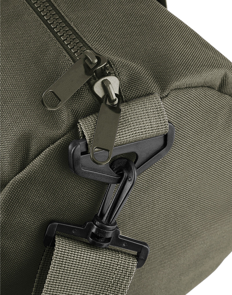 Side profile of the grey Universal Backpack.