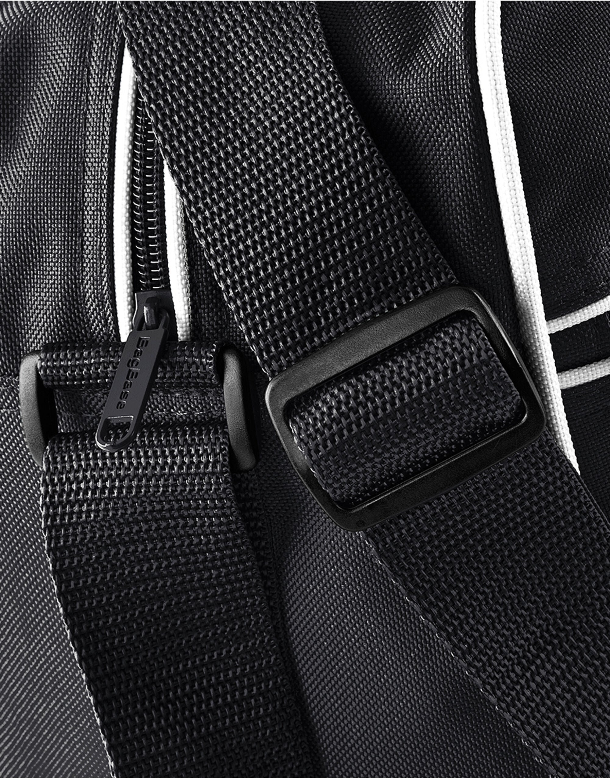 A black Bagbase Freestyle Holdall with a large main compartment.